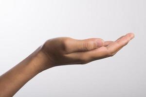 close-up van een vrouw hand geïsoleerd op een witte achtergrond foto