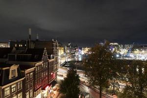 Amsterdam centraal station Bij nacht stadsgezicht foto