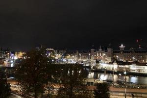 Amsterdam centraal station Bij nacht stadsgezicht foto