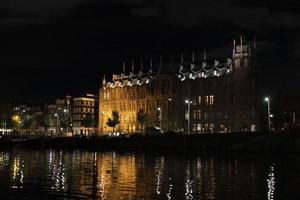 Amsterdam grachten reis Bij nacht foto