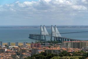Lissabon vasco da gama brug antenne visie panorama foto