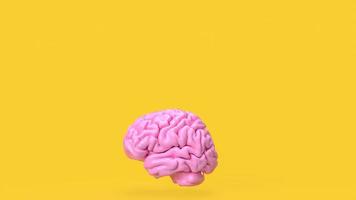 de roze hersenen Aan geel achtergrond voor creatief of idee concept 3d renderen foto