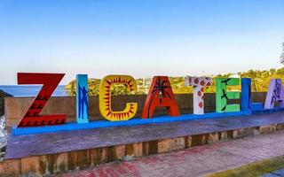 puerto escondido oaxaca Mexico 2023 kleurrijk zicatela puerto escondido belettering teken symbool Aan strand Mexico. foto