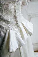 meisje in een bruiloft jurk detailopname foto