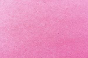 close-up shot van licht roze papier structuurpatroon voor achtergrond foto