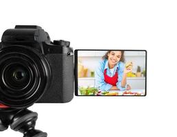 vlogger vrouw chef records een video van Koken recept foto