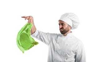 chef met radioactief en vervuild vlees steak. concept van vervuiling, ongezond en schadelijkheid foto