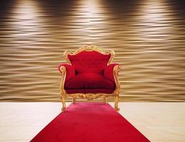 rood en goud luxe fauteuil. concept van succes en heerlijkheid foto