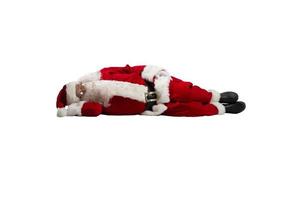 de kerstman claus is moe en slaapt van uitputting foto