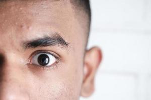 close-up van het oog van een man foto