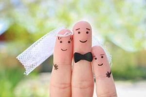 vingers kunst van gelukkig paar naar krijgen getrouwd. concept van stiefzoon is vreugde over bruiloft. foto