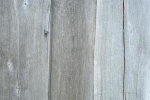 oud houten achtergrond met scheuren van lang veroudering foto