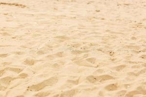 detailopname van zand patroon van een strand in de zomer foto