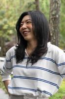 Aziatisch vrouw glimlach uitdrukking foto