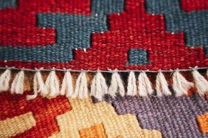 gekleurde tapijt huis tapijt textuur, knus warm coating foto