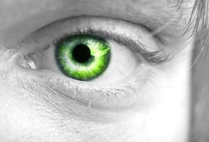 mans groen oog detailopname foto