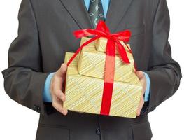 zakenman Cadeau geschenk doos met rood lint boog foto