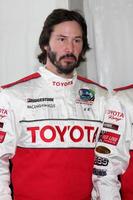 keanu reeves Bij de 33e jaar- toyota proces ras druk op dag Bij de groots prix bijhouden in lang strand ca Aan april 7 20092009 foto