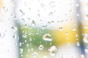 waterdruppels op een glas foto