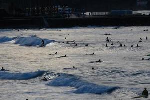 surfen school- Aan een oceaan strand foto