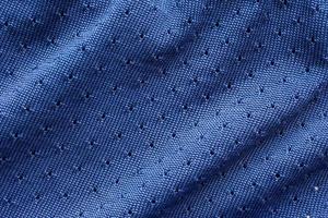 blauw sport- kleding kleding stof Amerikaans voetbal overhemd Jersey structuur foto