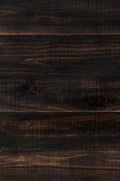 donker bruin hout achtergrond gemaakt van planken foto