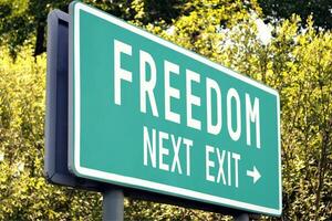 vrijheid - De volgende Uitgang weg teken foto