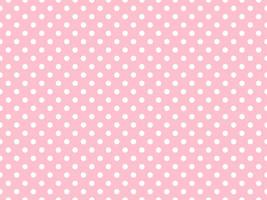 wit polka dots over- roze achtergrond foto