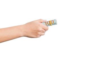 geïsoleerd beeld van vrouw hand- Holding een bundel van dollars Aan wit achtergrond. betaling concept foto