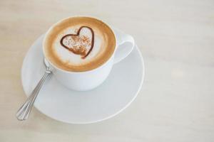 kop van latte koffie foto