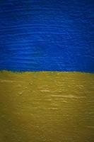 vlag van Oekraïne geschilderd Aan muur foto