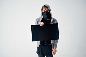 hacker met een kap hoofd hacken technologie veiligheid levensstijl foto