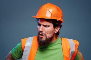 emotioneel Bouwers oranje moeilijk hoed veiligheid werk vermoeidheid blauw achtergrond foto