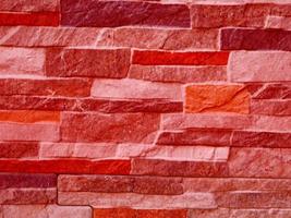 close-up van rode steen of rotswand voor achtergrond of textuur