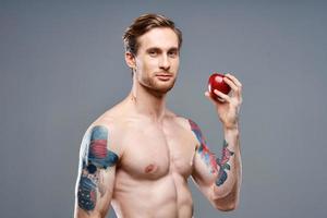 getatoeëerd Mens naakt torso gespierd spieren sport geschiktheid appel Gezondheid foto