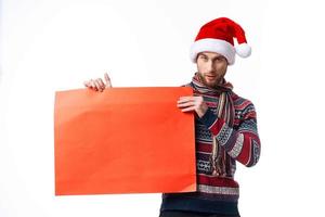 emotioneel Mens rood papier aanplakbord reclame Kerstmis licht achtergrond foto