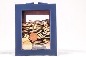 blauw doos met munten foto