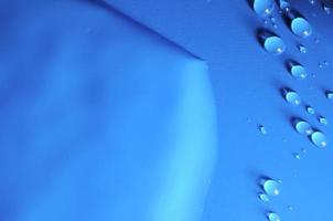 blauw achtergrond met water druppels foto