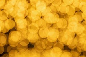 goud abstract licht vervagen bokeh achtergrond foto