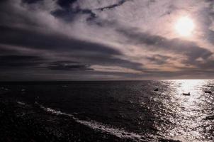 zonsondergang over de zee foto