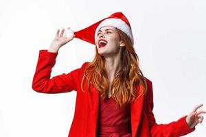 vrouw vervelend de kerstman kostuum decoratie emoties huis bedenken foto