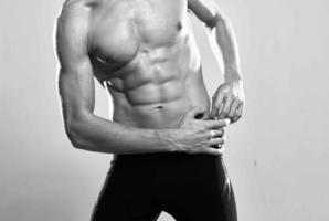 buikspieren training bodybuilder training motivatie bijgesneden visie poseren foto