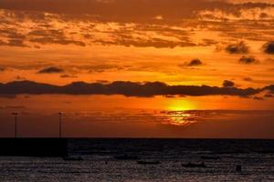 zonsondergang over de zee foto