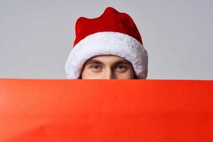 emotioneel Mens rood papier aanplakbord reclame Kerstmis kopie-ruimte studio foto