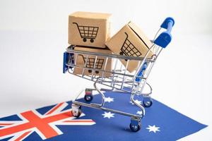 doos met boodschappen doen online kar logo en Australië vlag, importeren exporteren boodschappen doen online of handel financiën levering onderhoud op te slaan Product Verzenden, handel, leverancier concept. foto