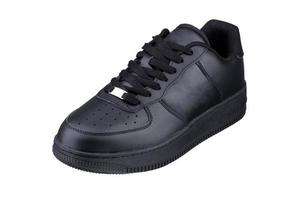 een zwart sneaker Aan een wit achtergrond. sport schoenen. foto