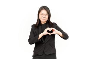 tonen liefde teken van mooi Aziatisch vrouw vervelend zwart blazer geïsoleerd Aan wit achtergrond foto