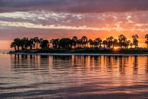 zonsondergang Bij Fred Howard park, tarpon veren foto