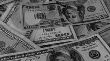zwart en wit achtergrond van ons valuta bankbiljetten financieel concept geld achtergrond honderd dollar rekeningen foto