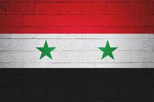 vlag van Syrië geschilderd Aan een muur foto